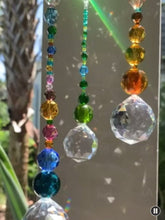 Load and play video in Gallery viewer, Faceted Crystal Chakra Sun Catcher/ Car Mirror

